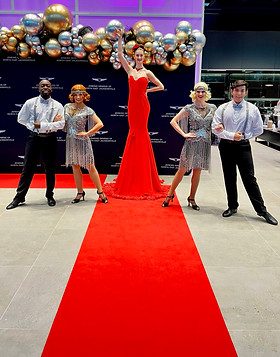 living red carpet dress Living Red Carpet Hostess - Book Luxury Welcome Act