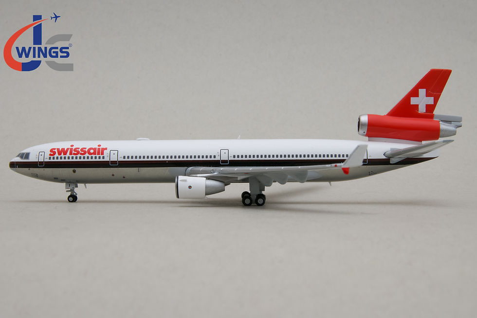 A scale airplane model of a Swissair McDonell Douglas MD-11 with registration HB-IWI made by JC Wings in 1:400 scale