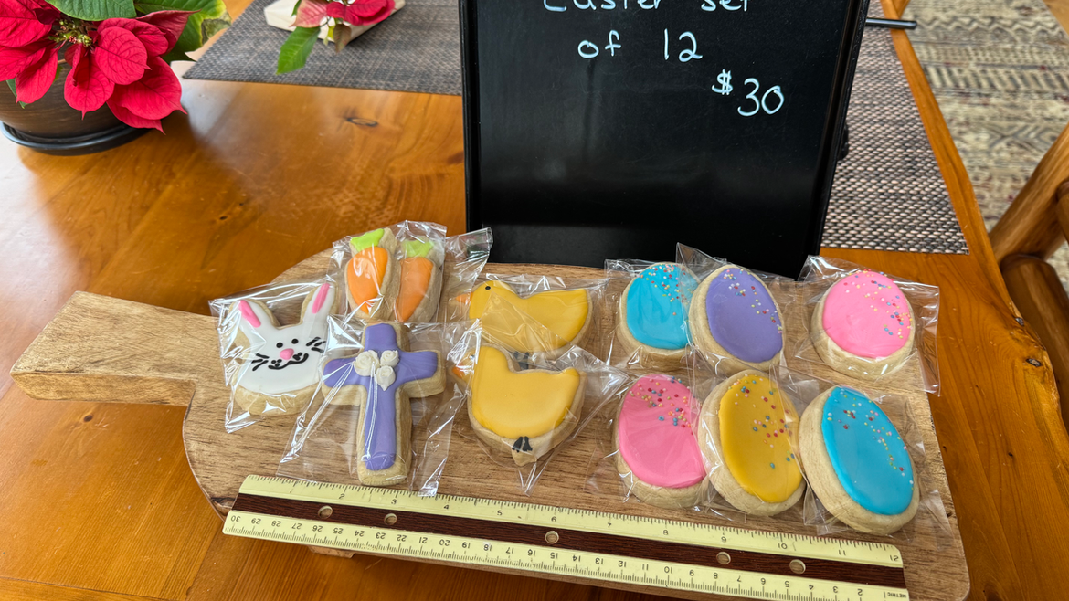 Easter cookies set of 12 $30 on wooden board JM Cabin Kitchen handcrafted cookies