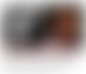 A YouTube video thumbnail with a black-and-white picture of a young, striking-looking trans woman on the left and a photo of photographer Mark Laita (an older, white man with stringy hair) on the right, with the words "The Road to Hell" along the border between them.