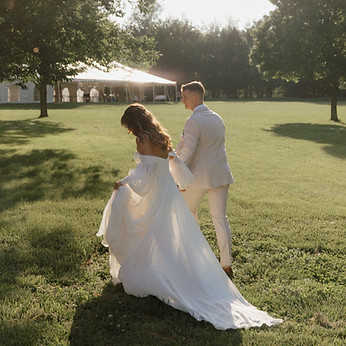 summer wedding photo on grassy lawn