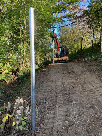 Cleared area for new fence to be put up around a fishery to stop otters
