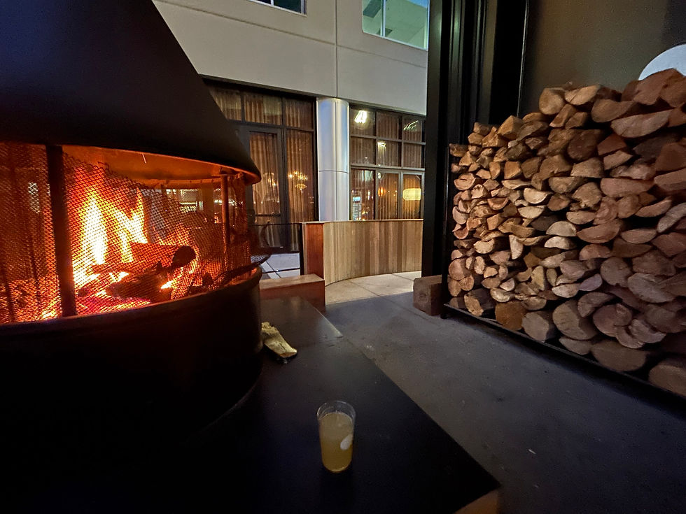 Eye-level view of stacked seasoned firewood ready for delivery