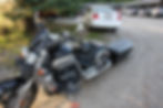 motorcycle towing a trailer