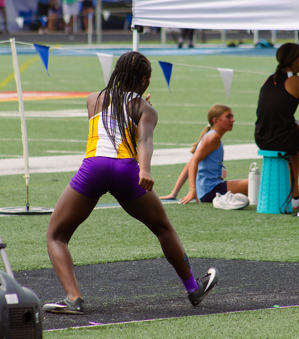 Leandria, Memphis Mustang athlete, jumping start in the long jump at AAU Region 6 Championships
