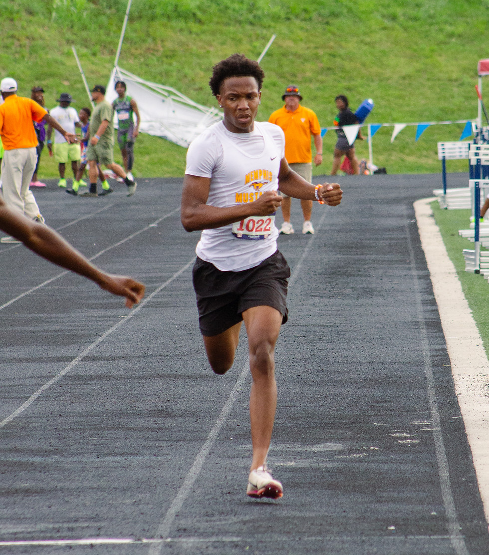 Travon Cole, Memphis Mustang athlete, crossing the finish line in the 400m at 2026 AAU Region 6 Championships