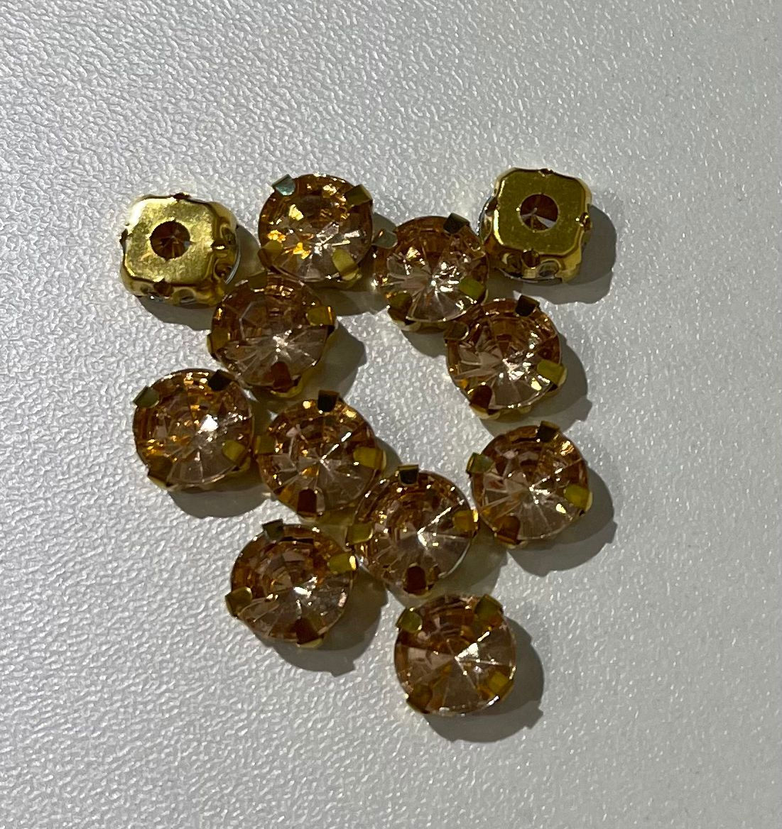 STRASS 4 GARRAS SS40 EM LATÃO