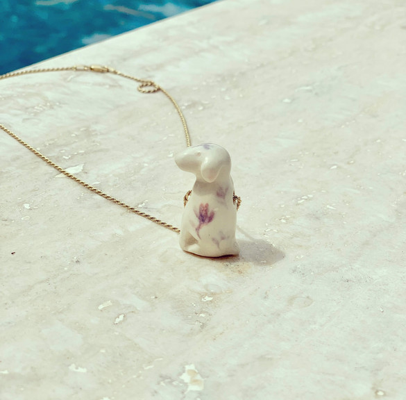 Puppy pendant in stoneware clay. jewelry by Lilu Escobar, Lilú Escobar