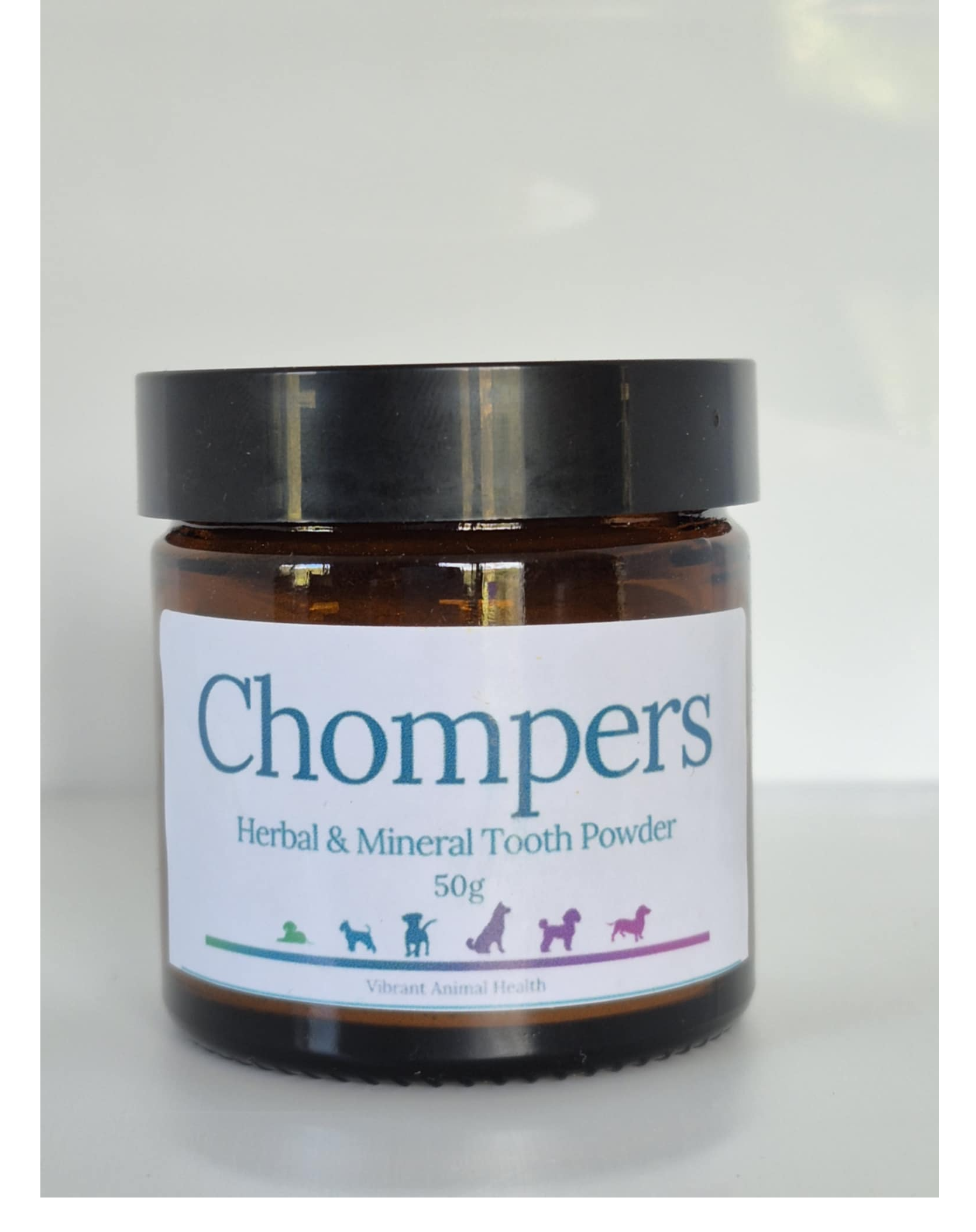 Chompers tooth powder jar front on