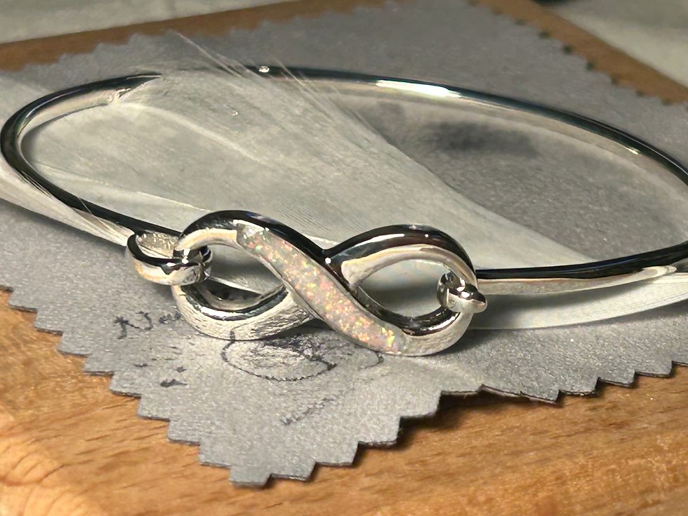 Thumbnail: Solid Sterling silver infinity bangle . 