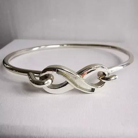 Thumbnail: Solid Sterling silver infinity bangle . 