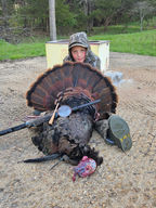 Successful turkey hunt with turkey and pot call.