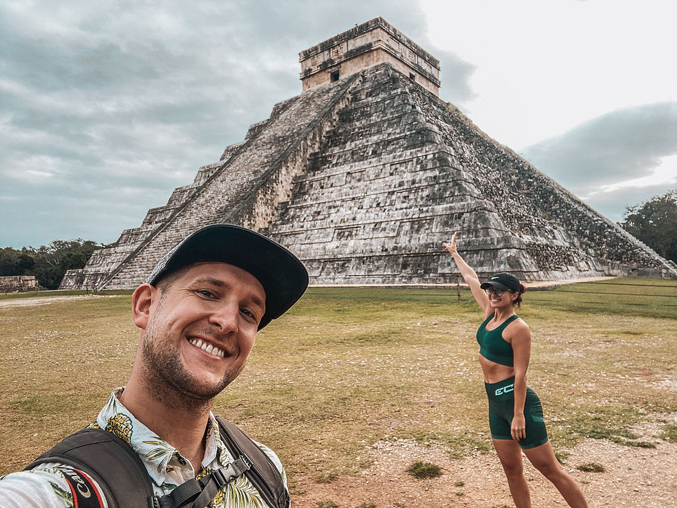 Couple visiting one of the seven wonders Chichen Itza