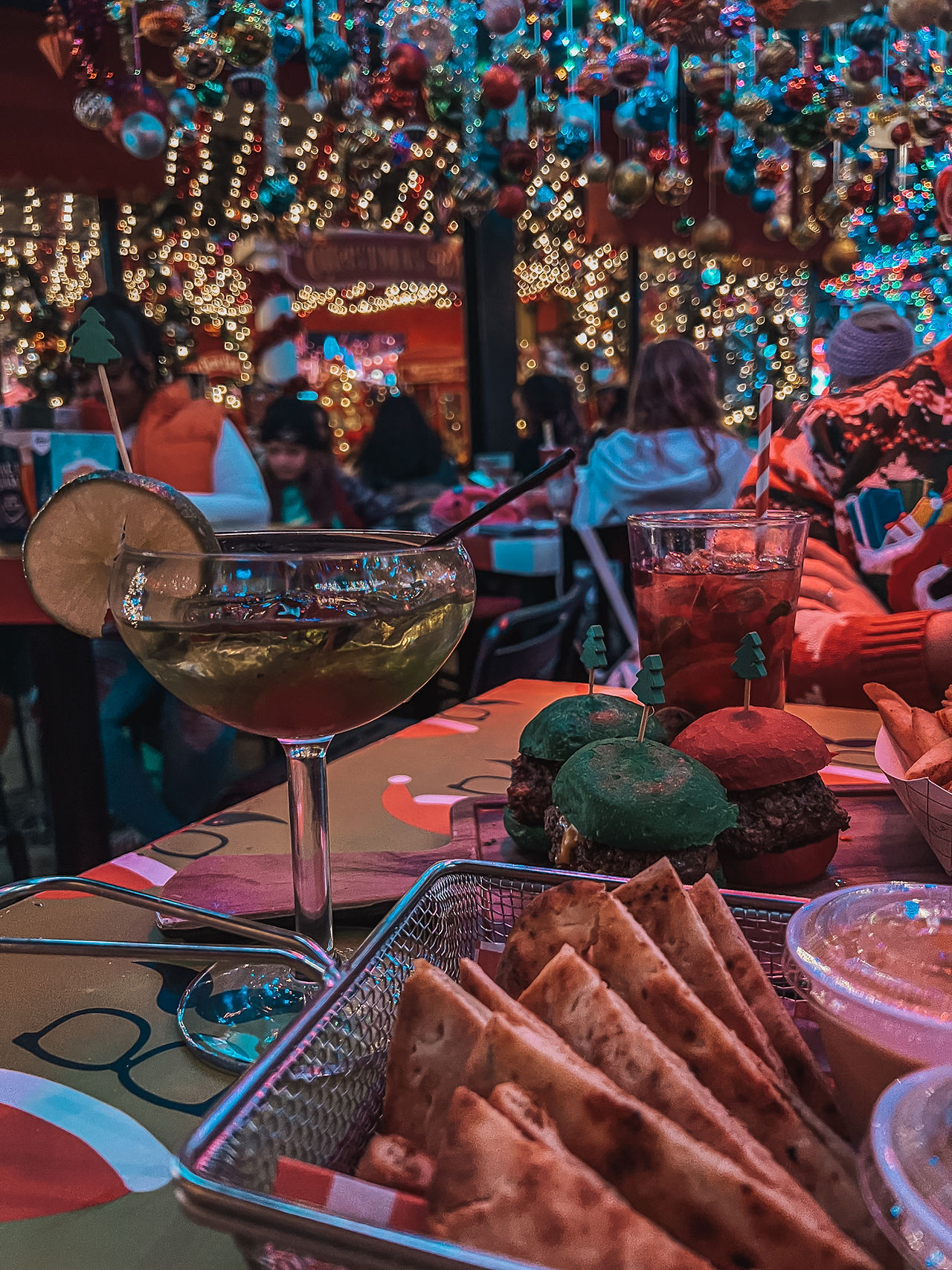 drink and burger at a bar