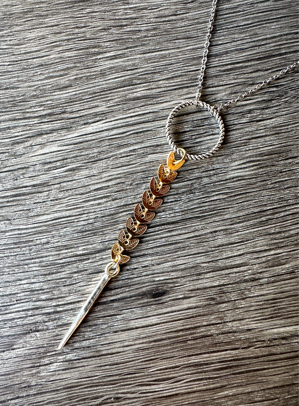 Thumbnail: Delicate mixed metal leaf & spear necklace