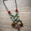 Thumbnail: Layered mixed metal patina gargoyle necklace