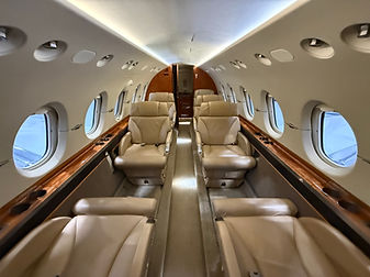 Aircraft interior detailing during JetGlow Reset service including cabin cleaning and surface restoration for private aircraft
