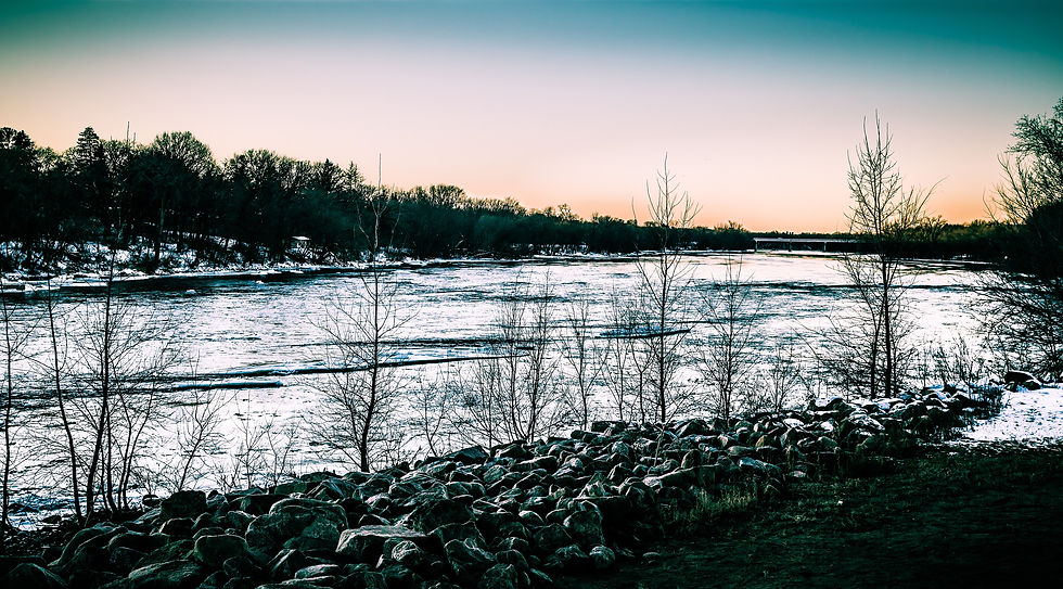 Winter sunset over the Mississippi River on the north side of St. Cloud Minnesota