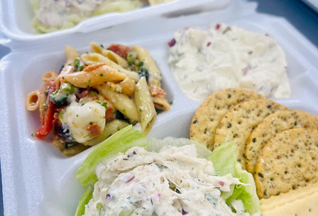 Ready-to-eat catering meal in a container.