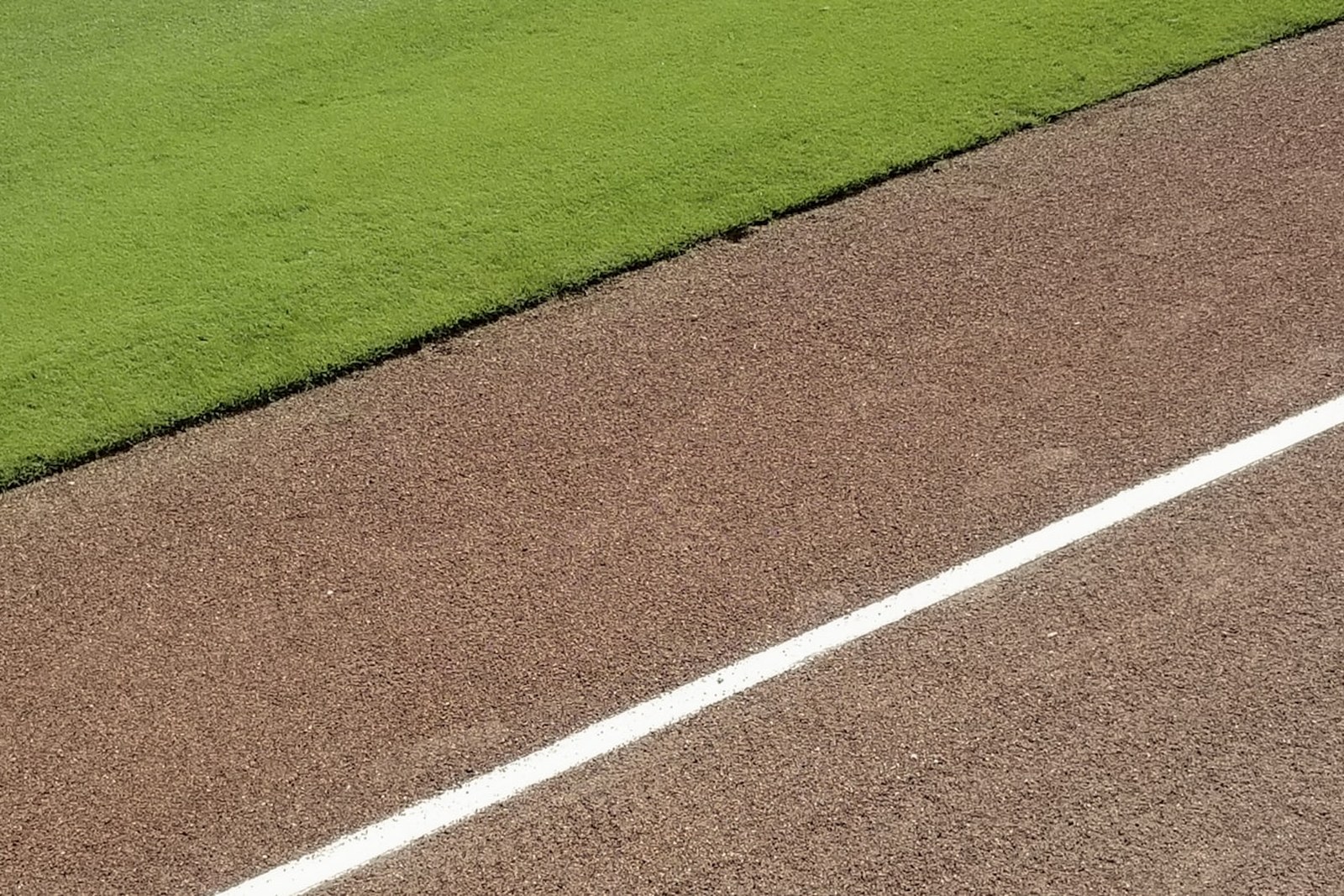 green grass field during daytime, empty of people