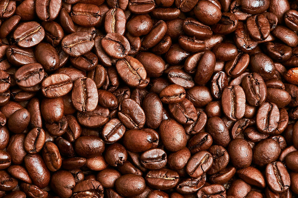 Brown coffee beans on brown wooden table