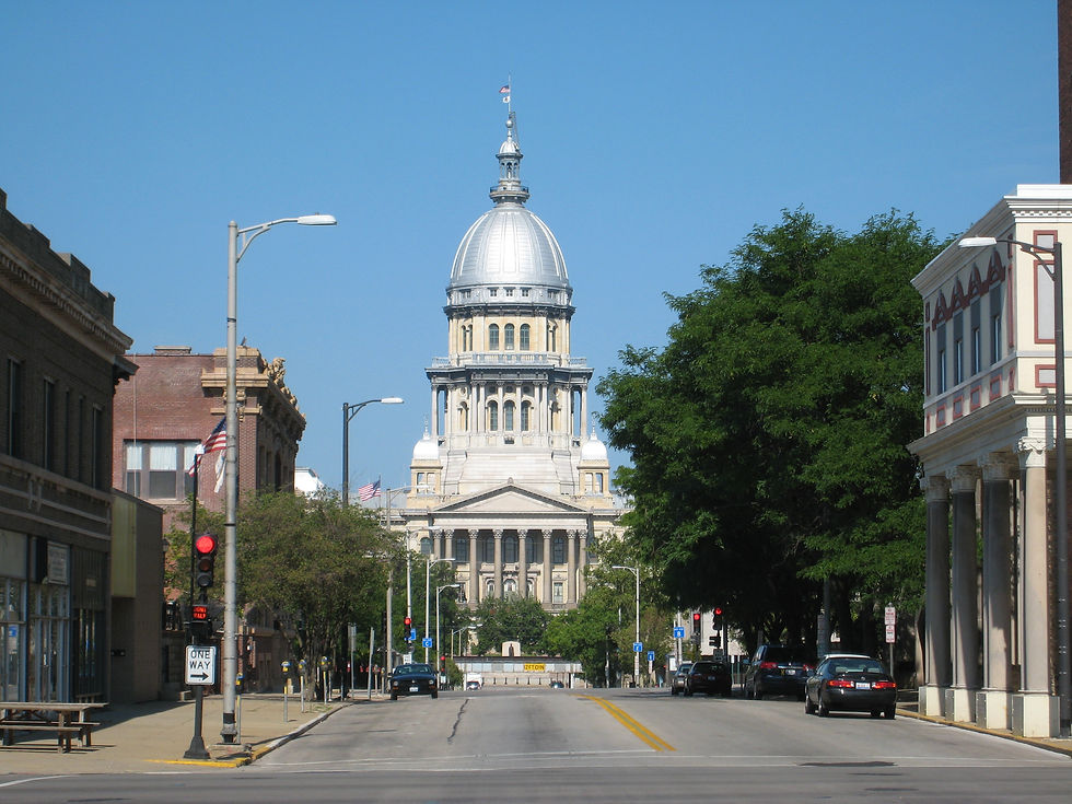 Downtown Springfield Illinois street view toward the Illinois State Capitol on a clear day