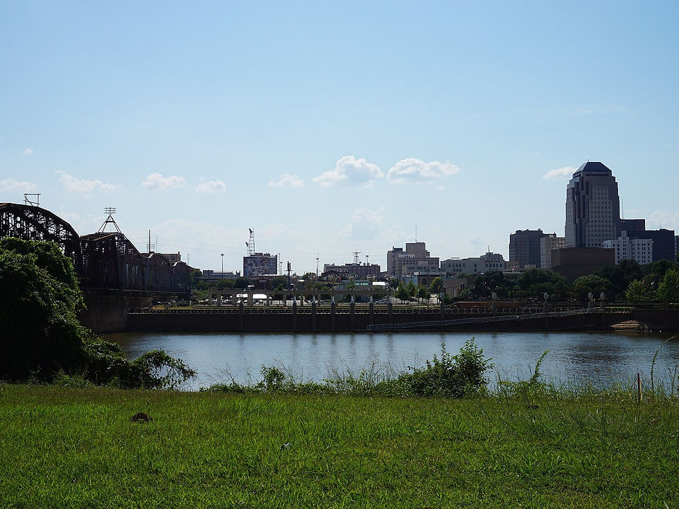 Shreveport, Louisiana skyline photographed from Bossier City — two banks of the Red River, no people as subject