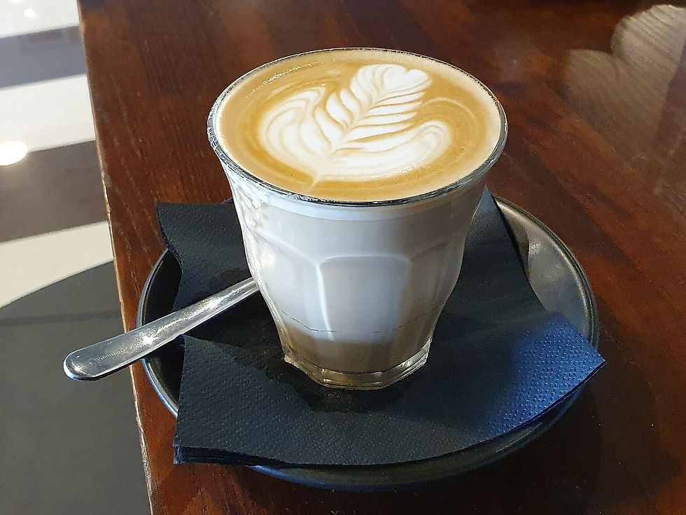 Coffee cup and cafe still life for a Maryville specialty coffee post