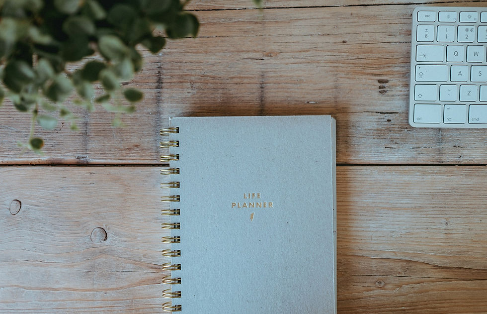 Gray notebook on wood
