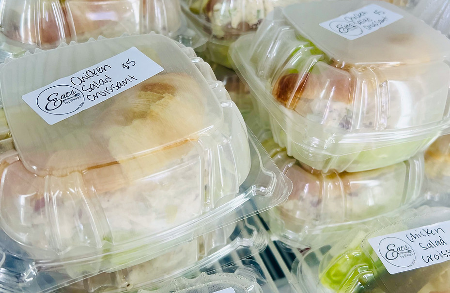 To-go sandwiches in a cooler.