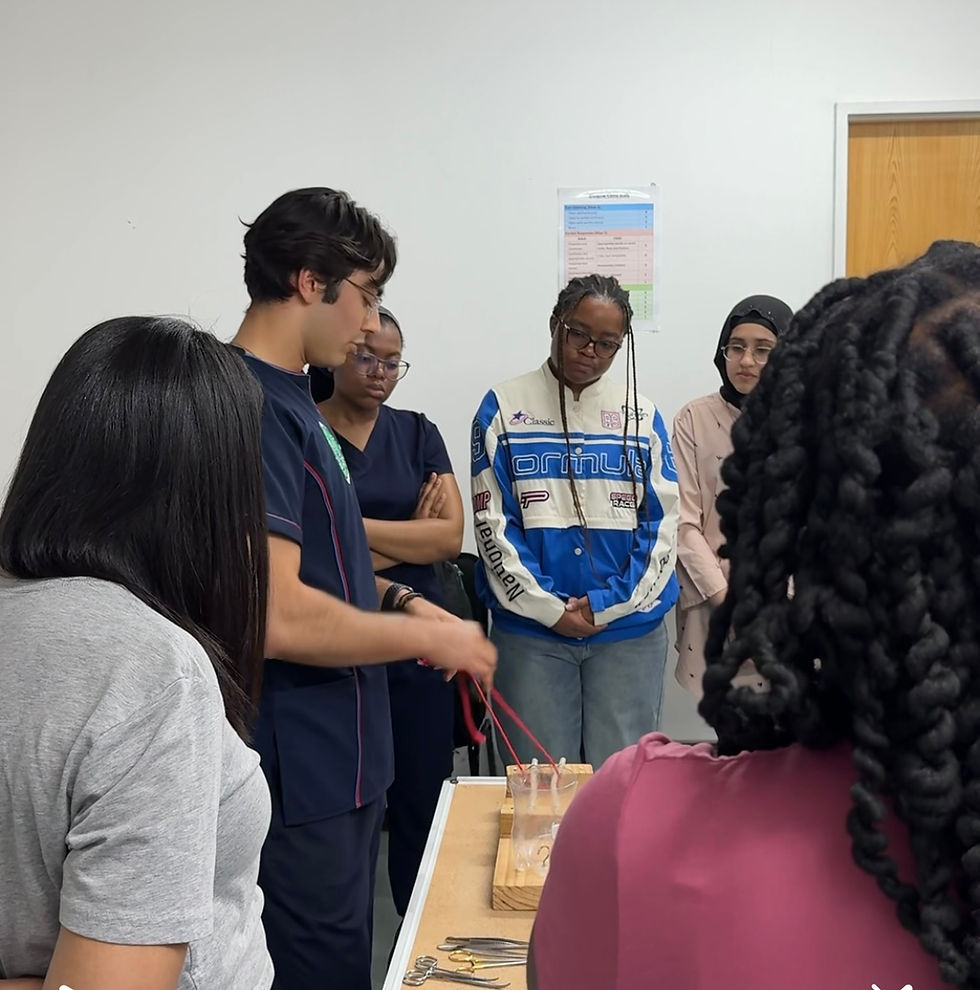 Eye-level view of a surgical training setup with suturing materials