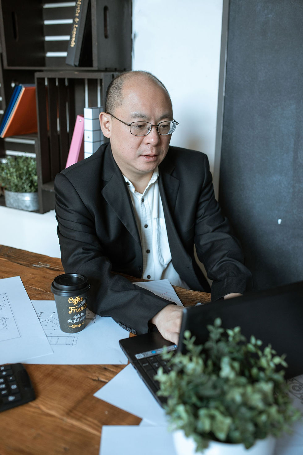 Businessman working on a laptop at his desk