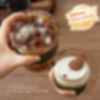 Iced coffee in a reusable glass with silicone sleeve and lid