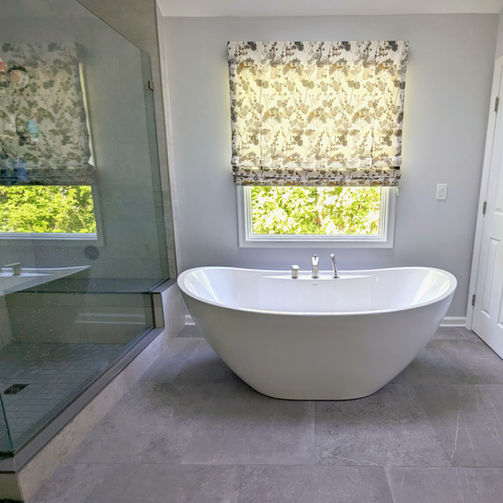 Primary bathroom
freestanding bathtub
toilet room
water closet
sauna
brushed nickel
kohler
