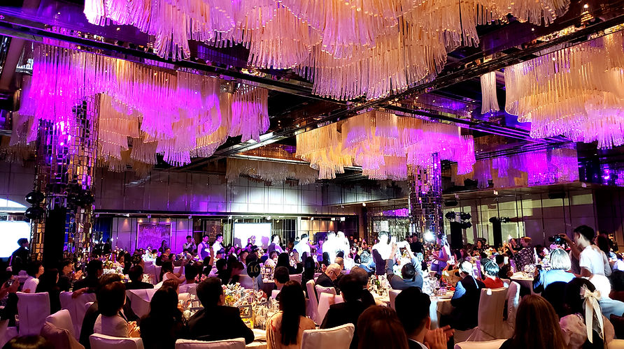 FATI LIVE BAND is performing a wedding entrance song for the newlyweds in the banquet hall of The Ritz-Carlton Hotel in Hong Kong.