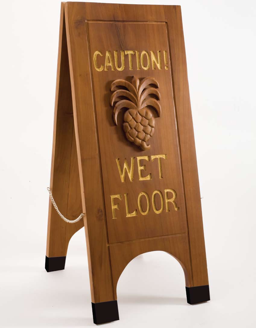 Carved wet floor sign