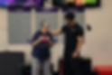 Personal trainer coaching an old person with kettle bells