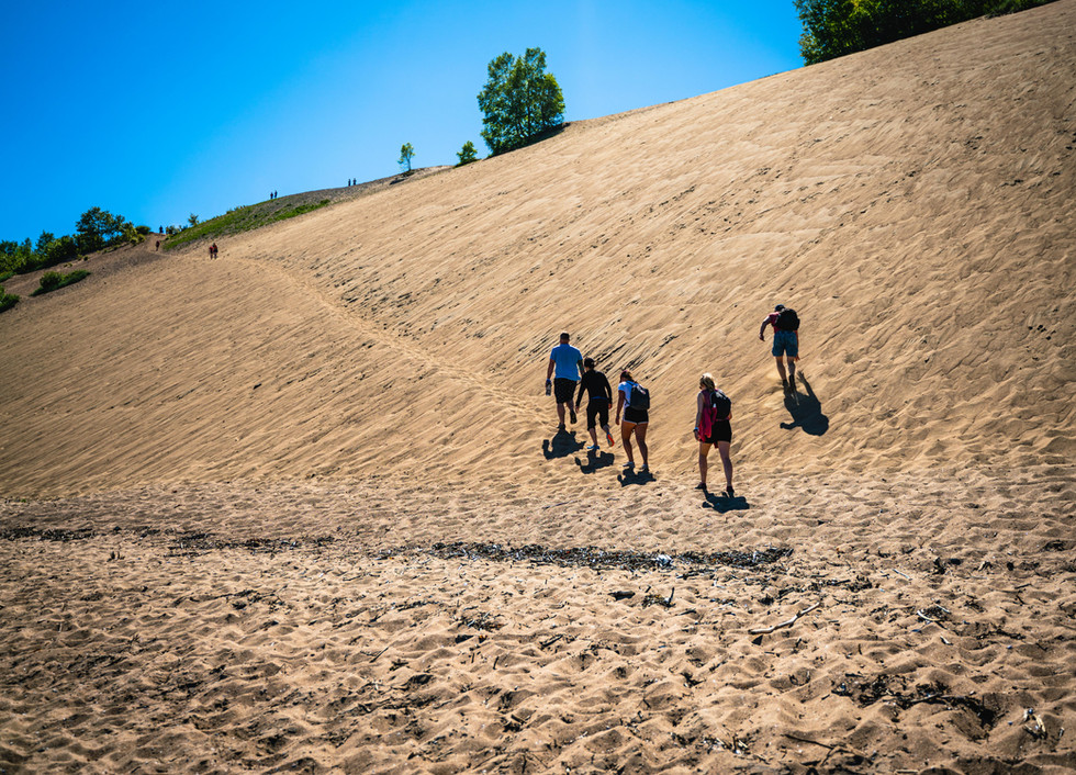 Traverse the sand dunes and swim in the St. Laurent