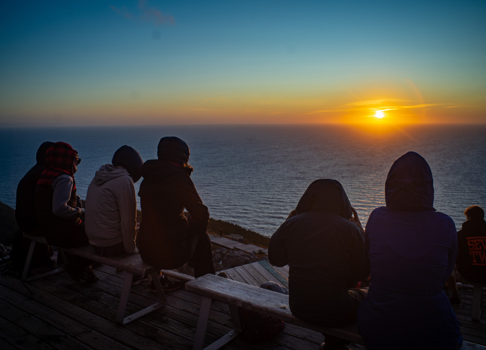 Go on an incredible sunset hike surrounded by dramatic coastal views
