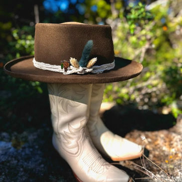 Cowgirl boots and cowgirl hat