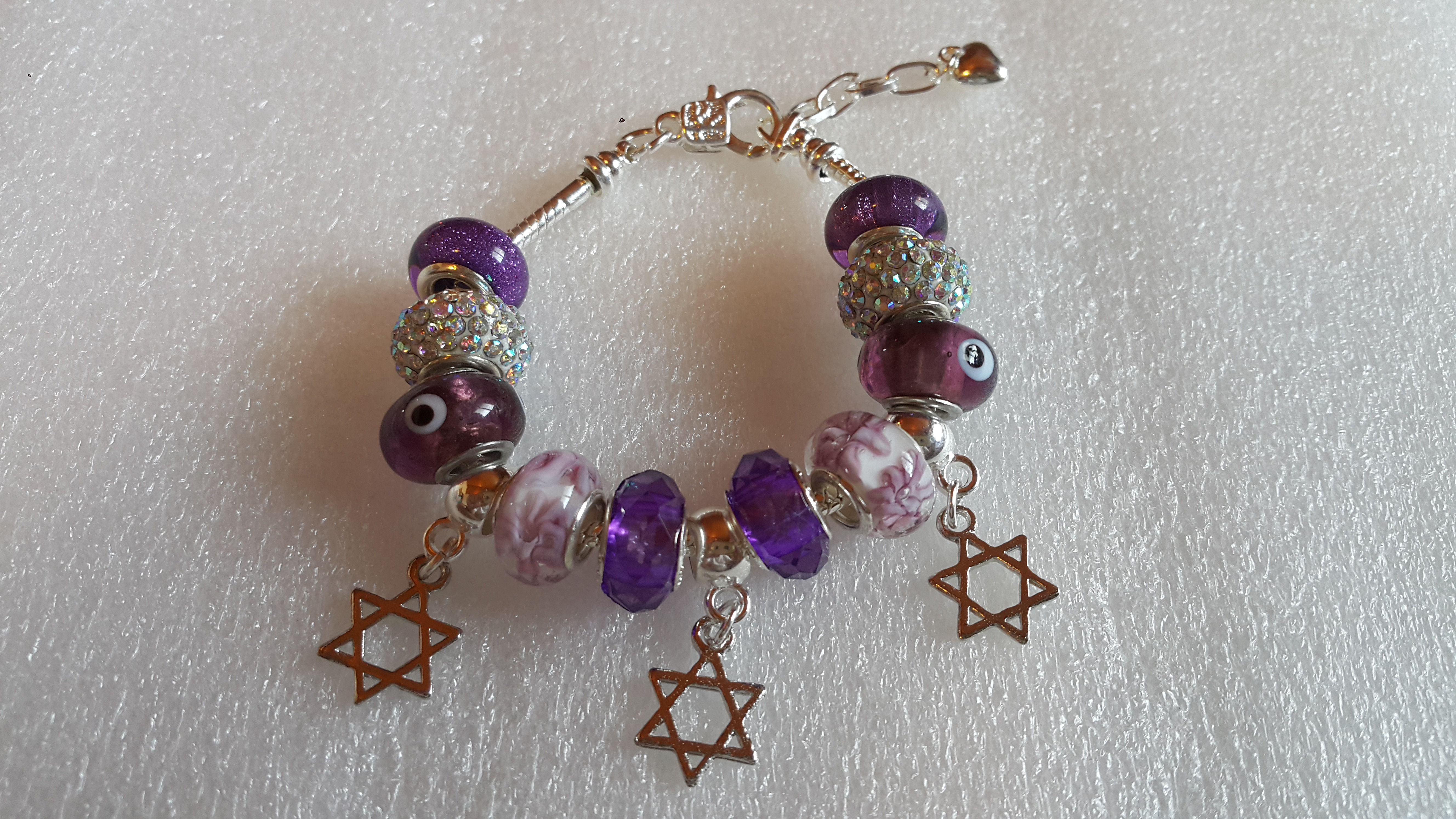 Bracelet with beads and 3 Star of David