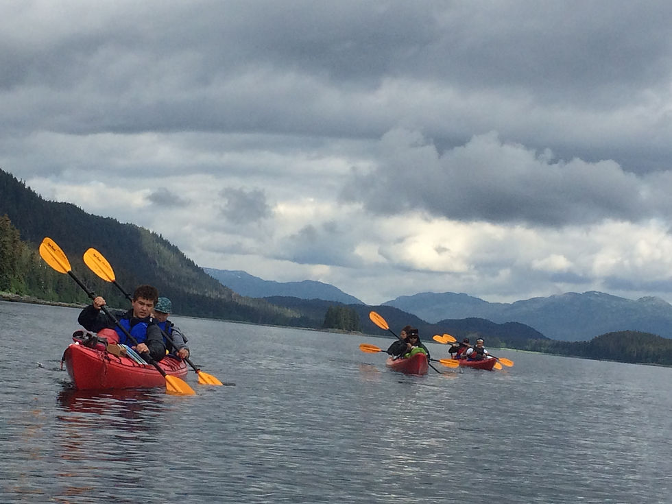 Kayaking to camp