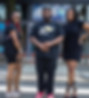 Group of 3 People Standing on Street