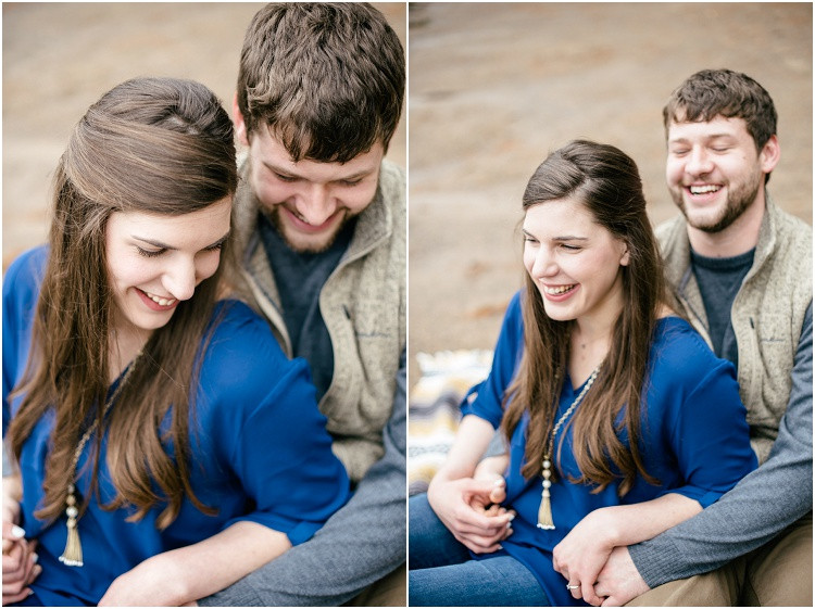 engaged-couple-sitting-in-lap-laughing-at-northwoods-lakeside-engagement-session-by-appleton-wedding-photographer-kyra-rane-photography