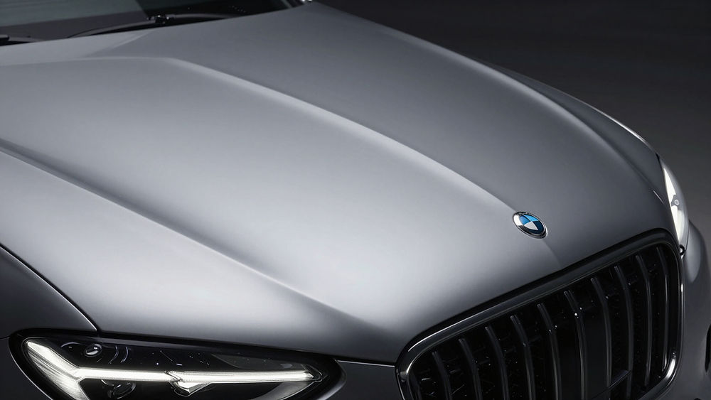 Silver car hood after at home car detailing services