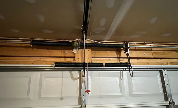 A repaired garage door torsion spring in Imperial, Missouri