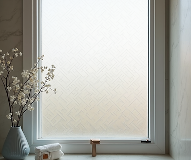 A modern-bathroom-window-pane-with-an-elegant-patterned-privacy-film-providing-obscurity.p