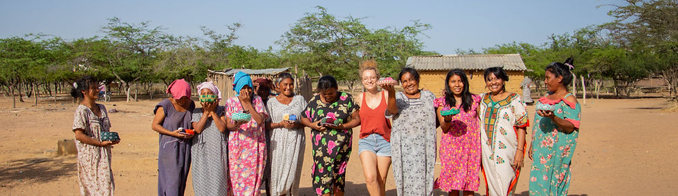 Jeanne and the Wayuu weaver women in the desert of La Guajira, Colombia