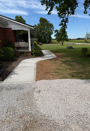 60' curved concrete sidewalk, also flowerbed edge.
