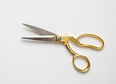 Scissors open gold and silver color isol